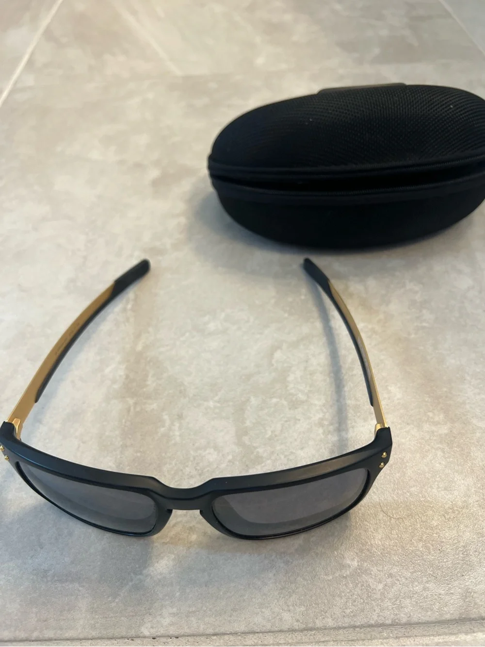 Oakley black gold
